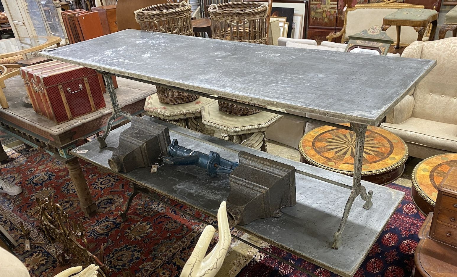 A Victorian style rectangular cast iron garden table with tin top, width 210cm, depth 69cm, height 71cm